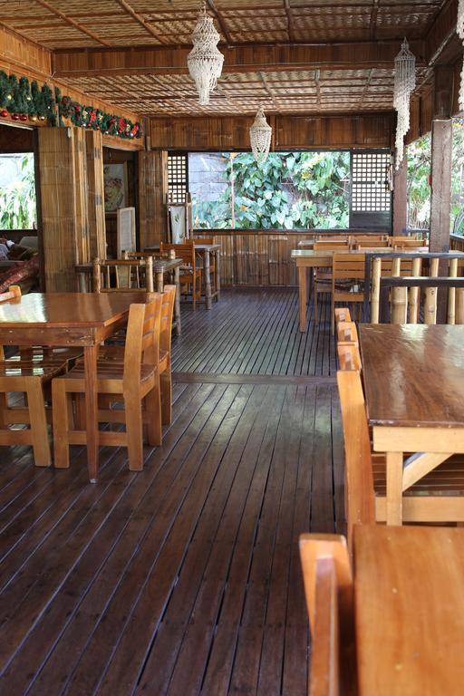 פוארטו גאלרה Bamboo House Beach Lodge & Restaurant מראה חיצוני תמונה