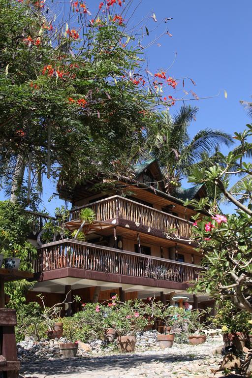 פוארטו גאלרה Bamboo House Beach Lodge & Restaurant מראה חיצוני תמונה
